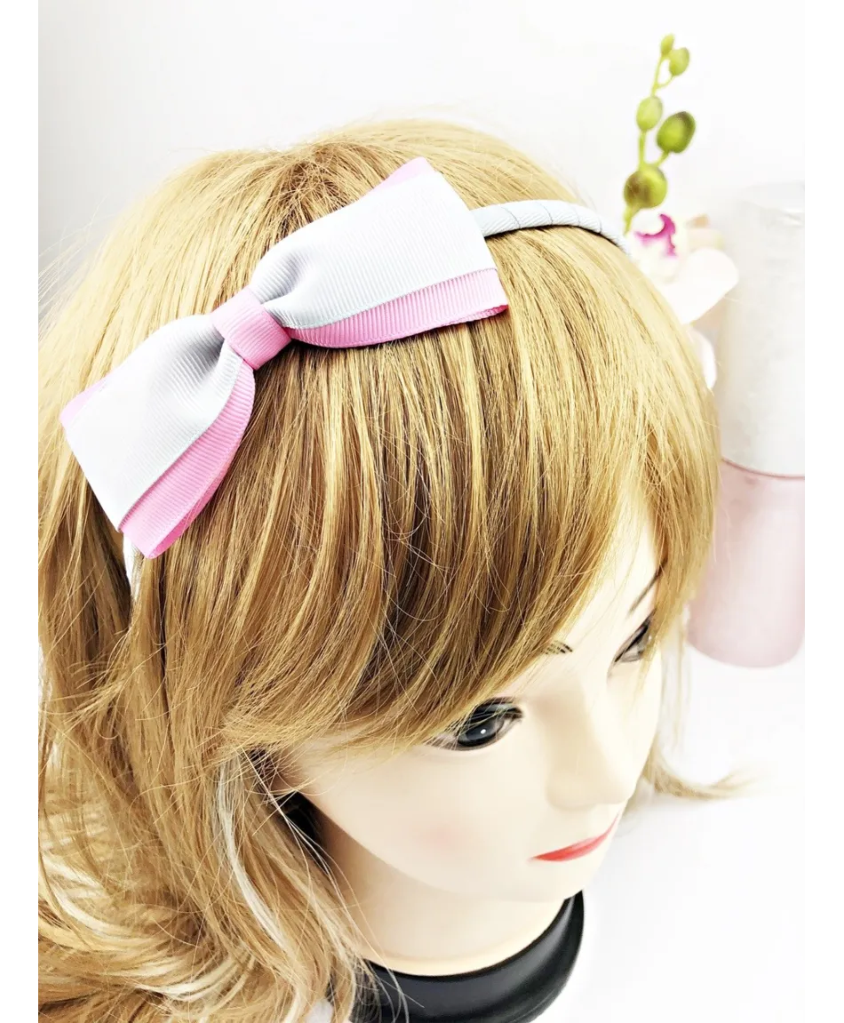 Opaska do włosów z kokardką niebieska/różowa Opaska do włosów z kokardką niebieska/różowa
