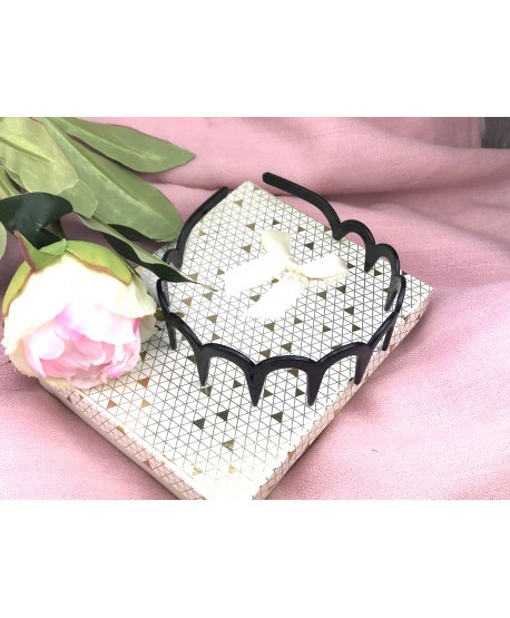 Czarna opaska z długimi zębami