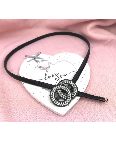 Czarny pasek na sprężynce z ozdobną klamrą