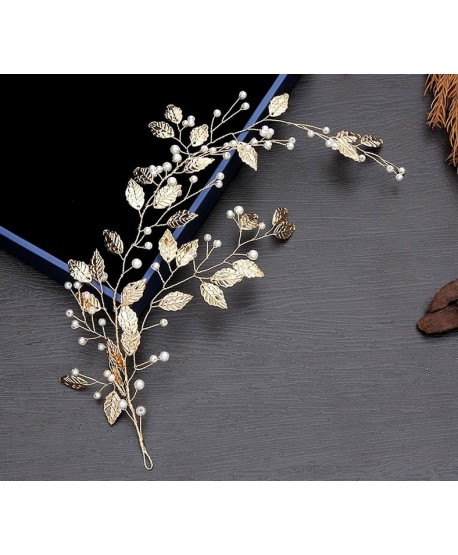 Ozdoba na złotym druciku w formie listków