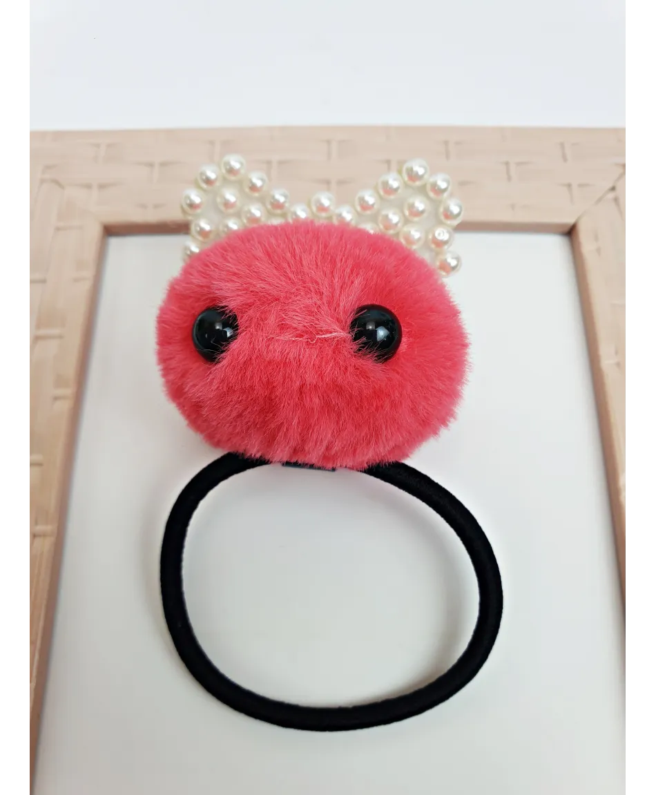 Gumka z pomponem i kokardą z perełek