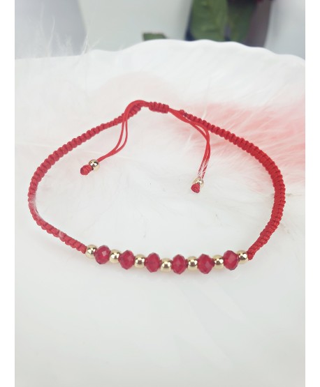 Bransoletka z czerwonymi kryształkami i złotymi kuleczkami