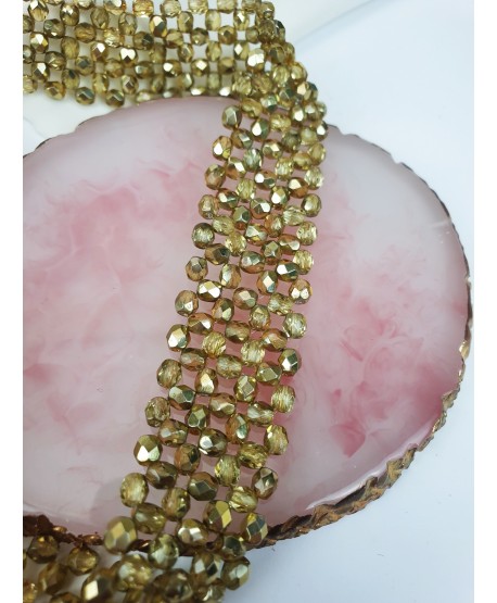 Choker ze złotych koralików