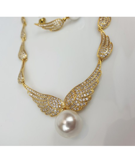 Złoty komplet biżuterii skrzydełka z perłą