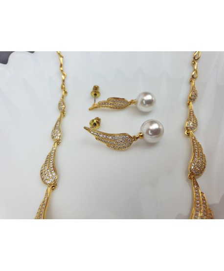 Złoty komplet biżuterii skrzydełka z perłą