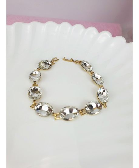 Bransoletki białe kryształki w złocie
