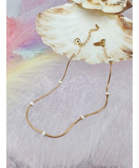 Bransoletka na kostkę stal złota koraliki