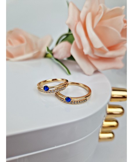Pierścionek złoty stal z niebieskim oczkiem