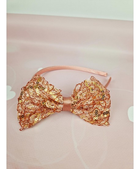 Opaska z błyszczącą kokardką