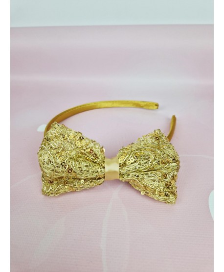 Opaska z błyszczącą kokardką