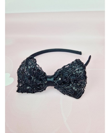 Opaska z błyszczącą kokardką