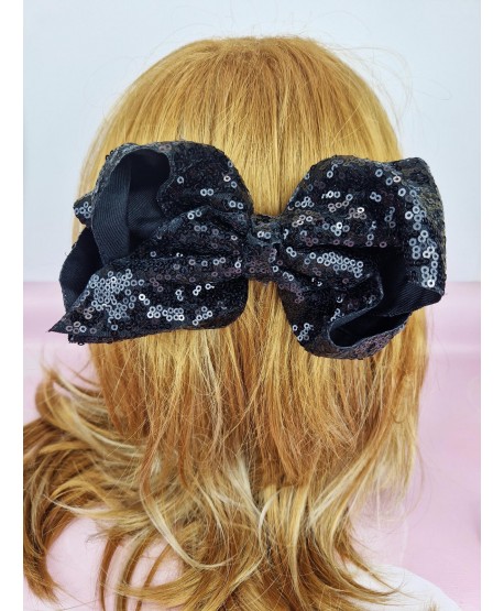Cekinowa kokardka do włosów na spince