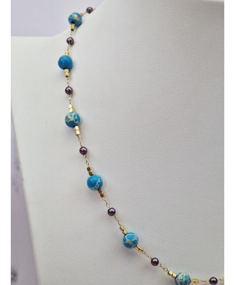 Naszyjnik celebrytka stal z błękitnymi koralikami