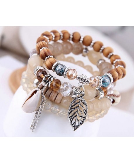 Zestaw bransoletek koraliki na gumce z muszelką i listkiem