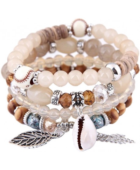 Zestaw bransoletek koraliki na gumce z muszelką i listkiem