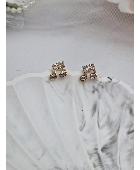 Kolczyki stal złote błyszczące nutki