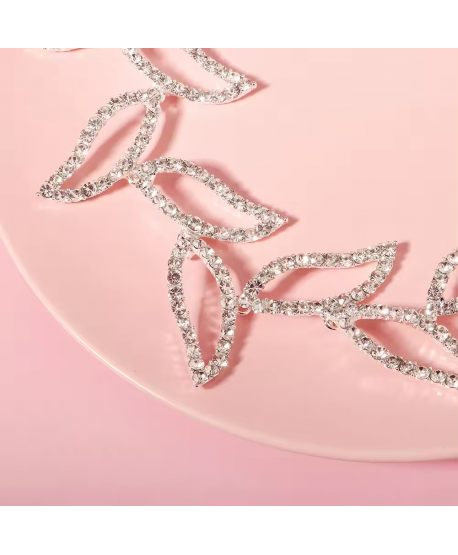 Ozdobna gałązka we włosy srebrne listki na tasiemce