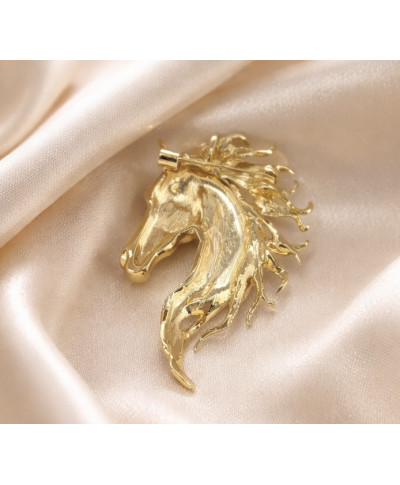 Złota broszka – głowa konia w eleganckim stylu