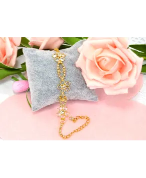 Bransoletka przezroczyste kryształki w złotej oprawie w różnych wzorach