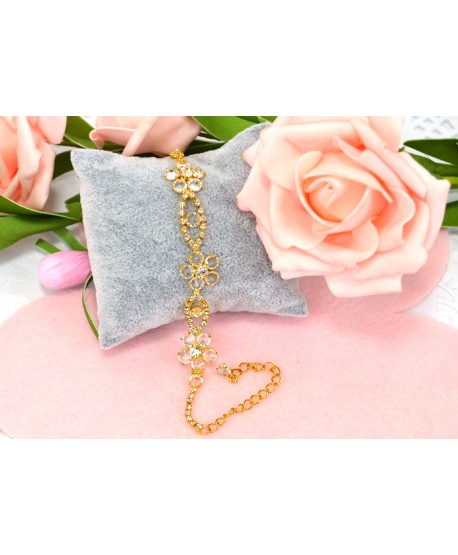 Bransoletka przezroczyste kryształki w złotej oprawie w różnych wzorach