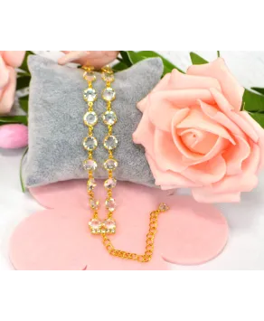 Bransoletka przezroczyste kryształki w złotej oprawie w różnych wzorach