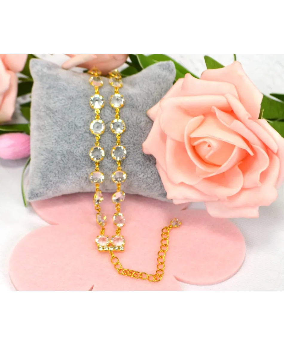 Bransoletka przezroczyste kryształki w złotej oprawie w różnych wzorach