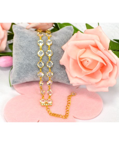 Bransoletka przezroczyste kryształki w złotej oprawie w różnych wzorach