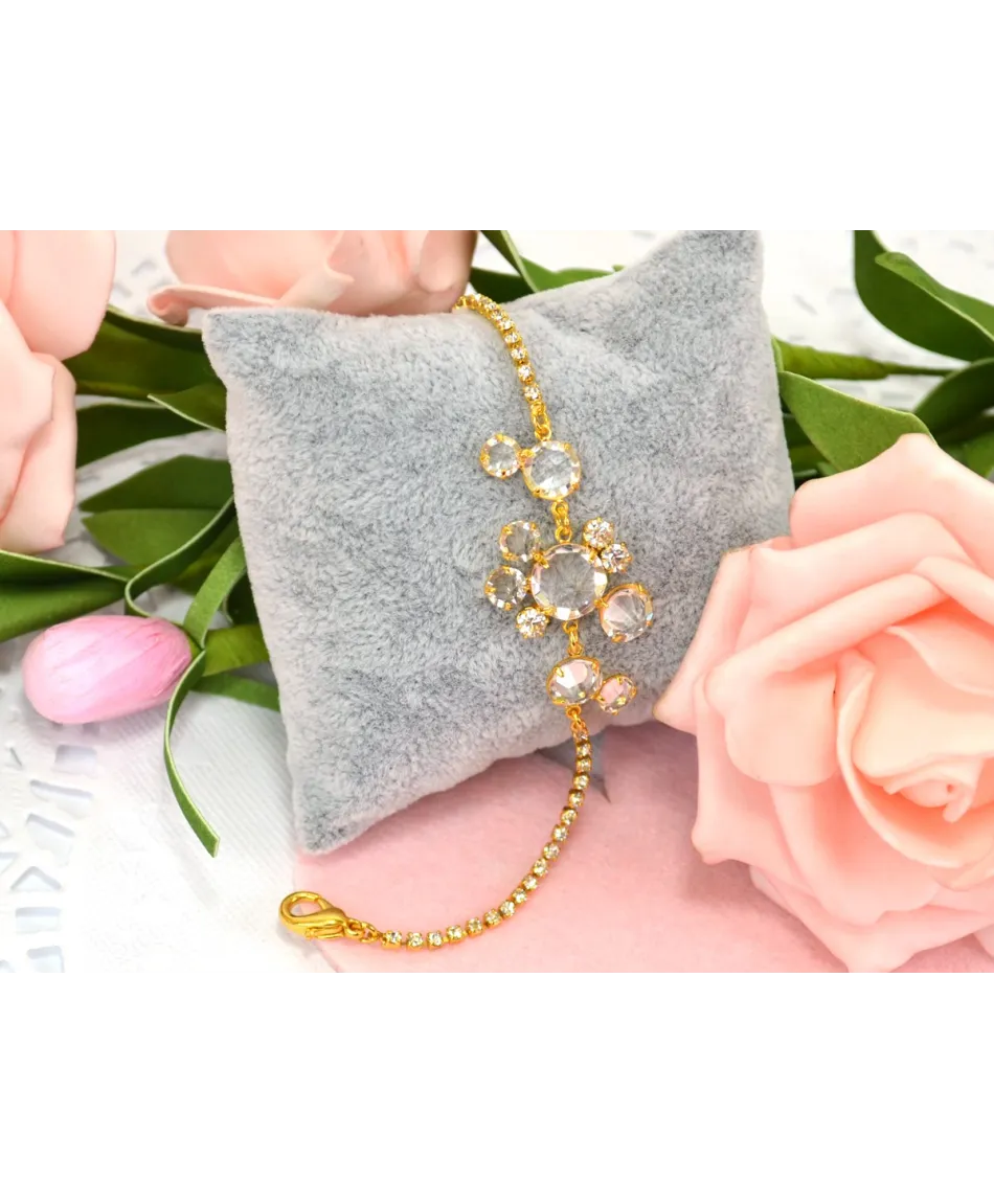 Bransoletka przezroczyste kryształki w złotej oprawie w różnych wzorach