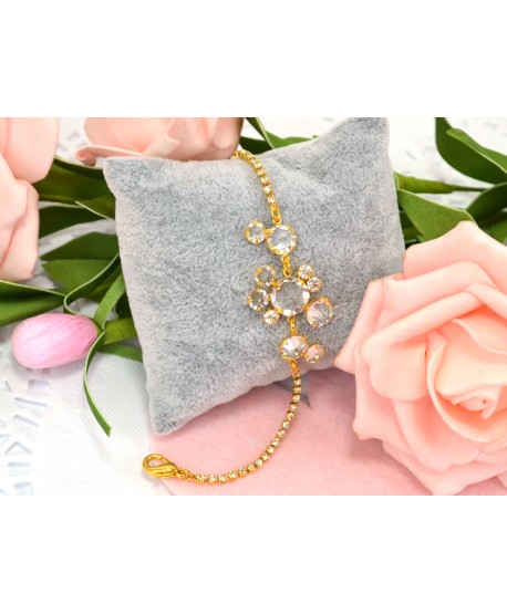 Bransoletka przezroczyste kryształki w złotej oprawie w różnych wzorach